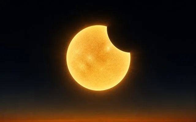 First contact phase showing the Moon beginning to cover the Sun